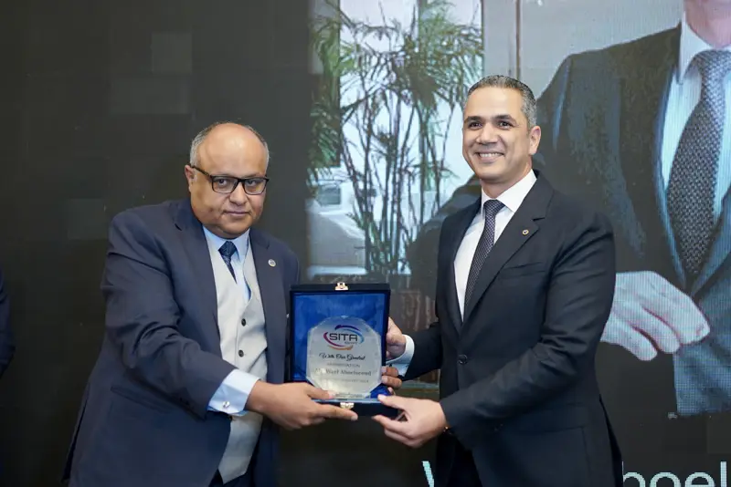 Recognition award presented on stage