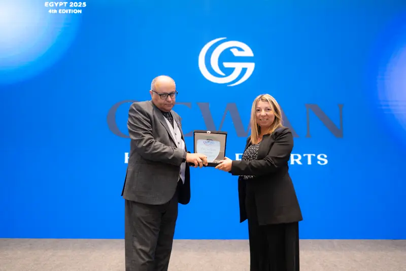 Recognition award presented on stage