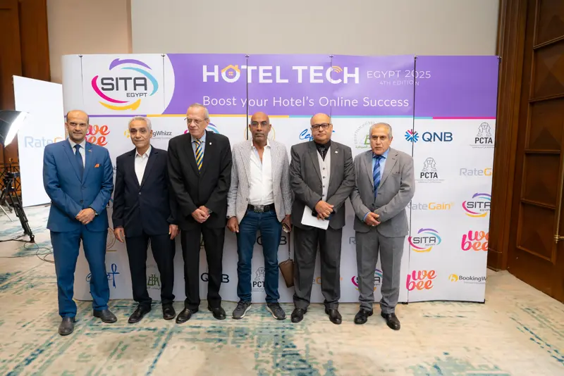 Guests at the Hotel Tech 2025 backdrop